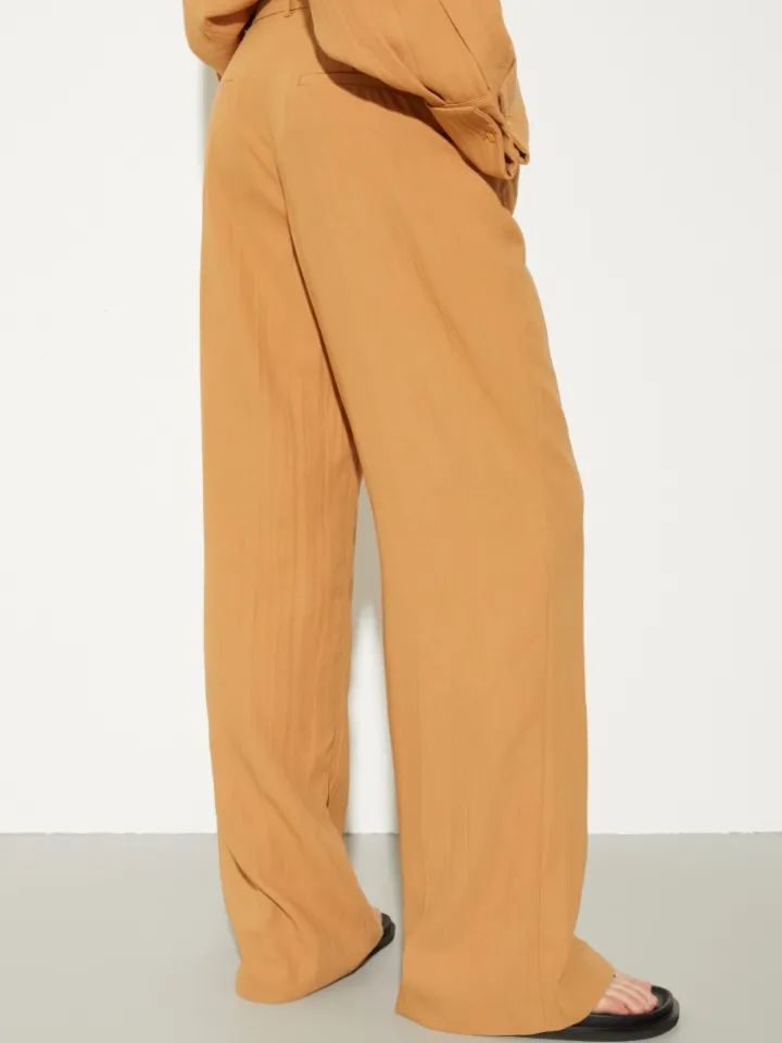 Crinkled envers-satin trousers - terra cotta