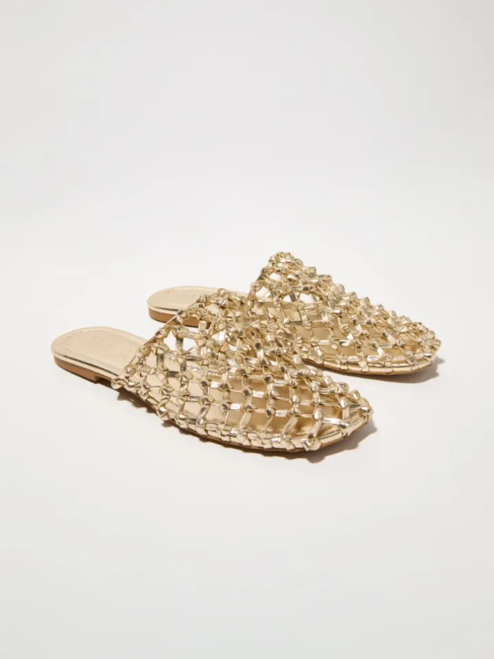 Laminated braided flat mules - gold